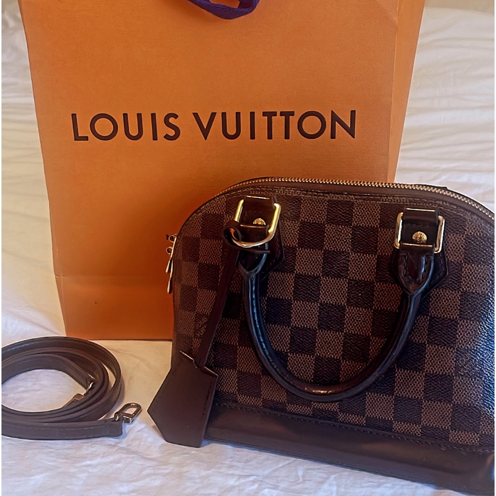 Authentic Louis Vuitton Alma purse